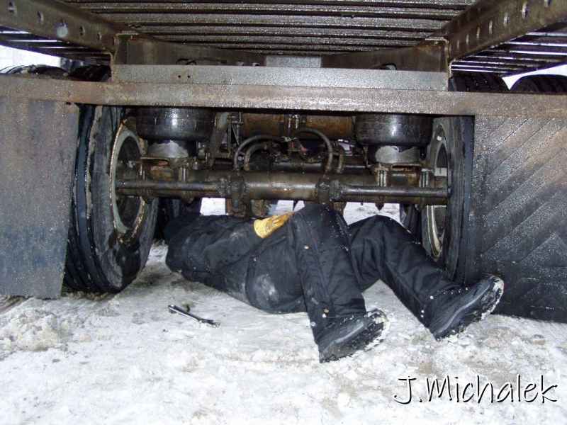 16-John under the trailer.JPG